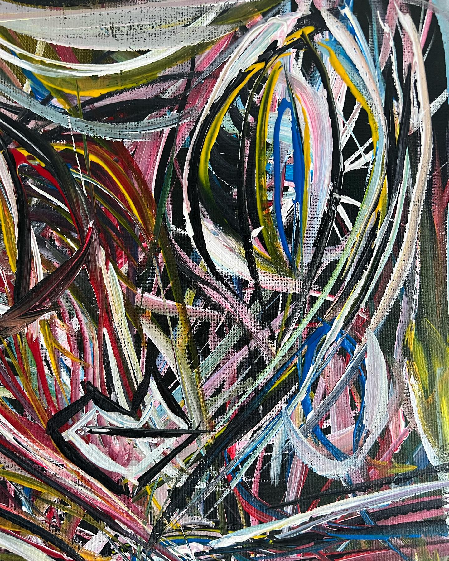 Abstract artwork with multicolored brush strokes on a black background