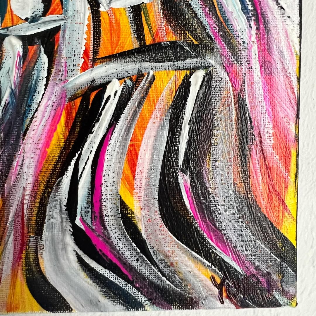 Abstract painting with colorful brush strokes on a textured surface
