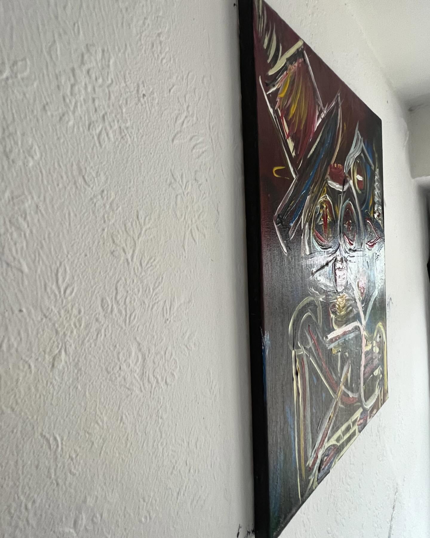 Abstract painting on a white wall
