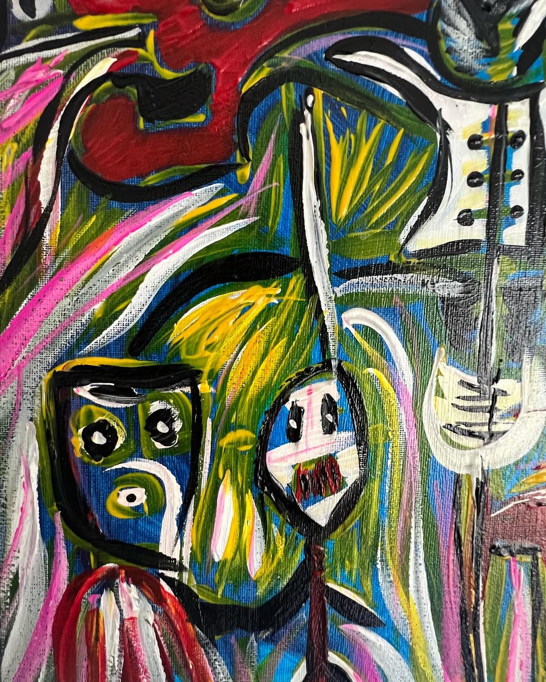 Detail view of Symphony of Souls, Art Brut painting by Yuri Tarkovski — vibrant red, yellow, and green brushstrokes with abstract faces.
