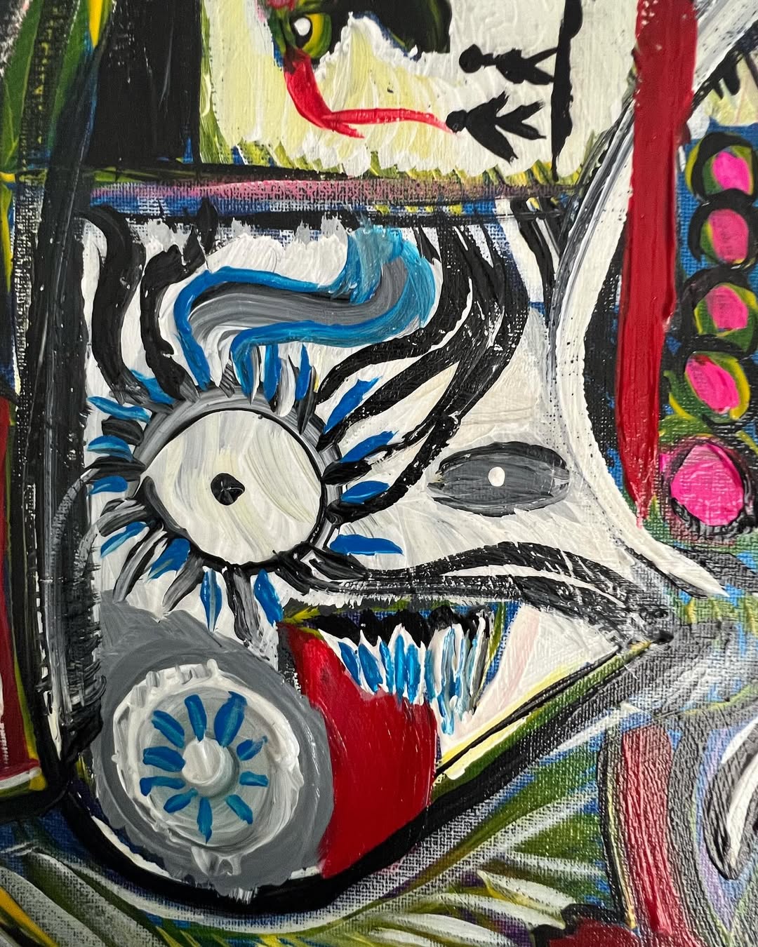 Close-up of Symphony of Souls, Art Brut painting by Yuri Tarkovski — expressive black, blue, and red brushstrokes with abstract eye motif.