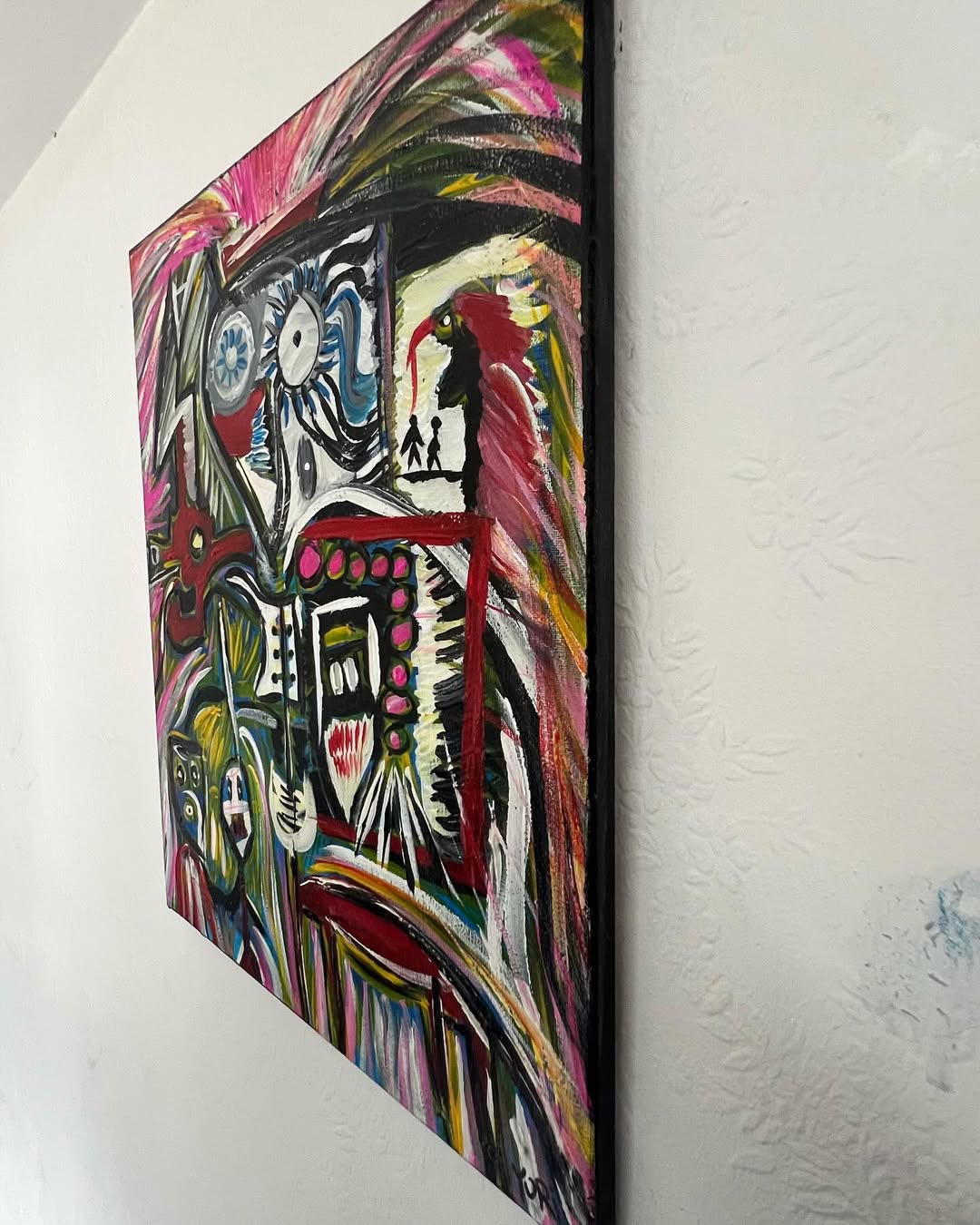 Angled view of Symphony of Souls, Art Brut acrylic painting by Yuri Tarkovski — vivid abstract forms and strong color contrasts on canvas.
