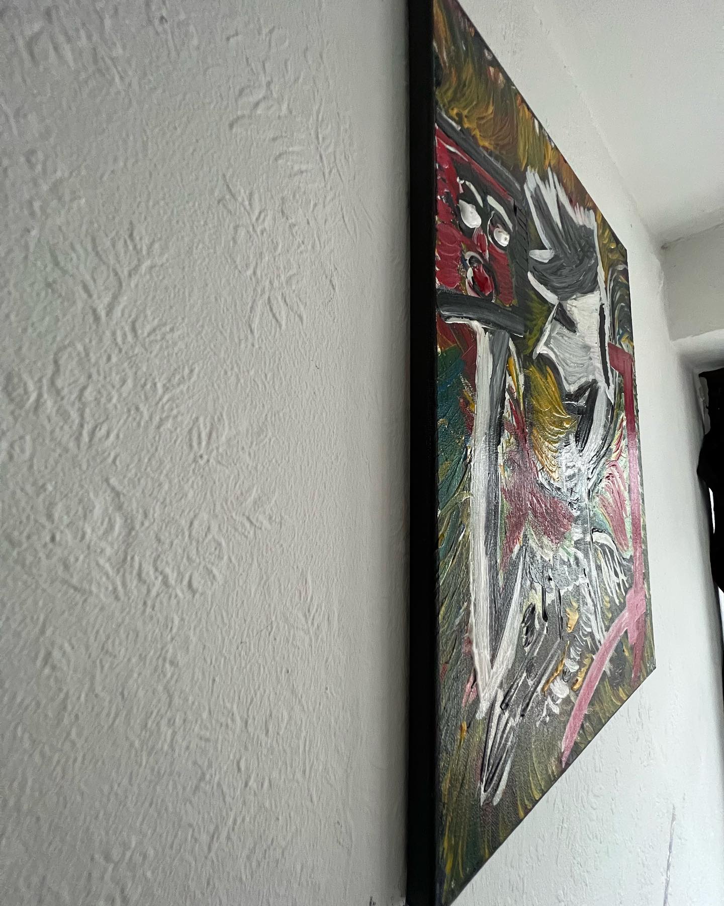 Abstract painting on a white wall
