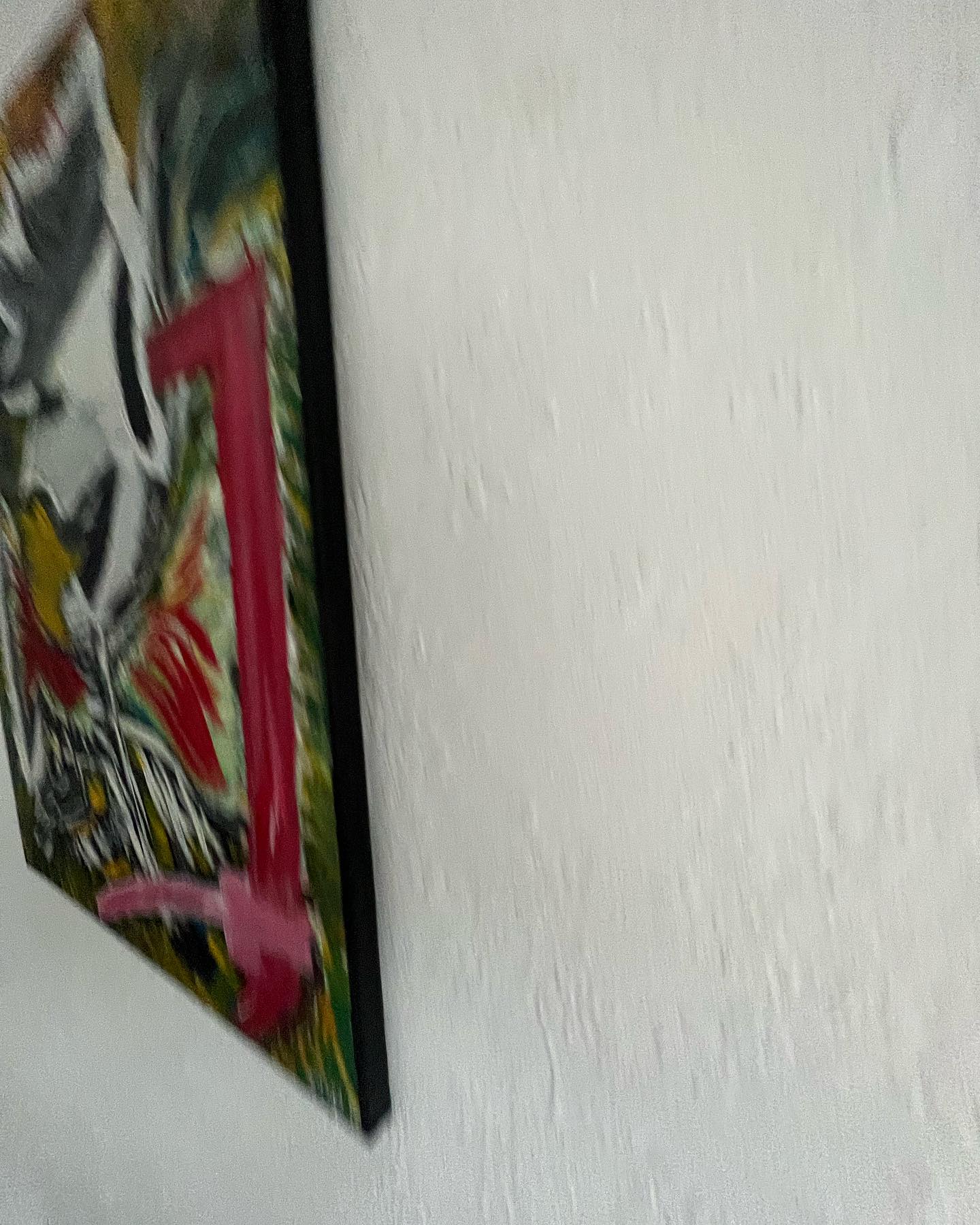 Colorful abstract painting on a white wall